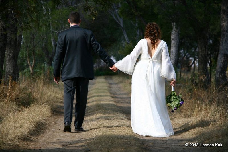 Bride and groom in road