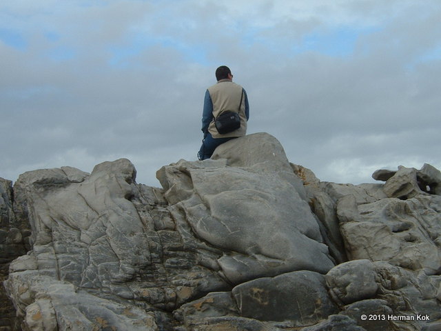 Man sitting on rocks