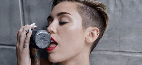 Miley cyrus with hammer