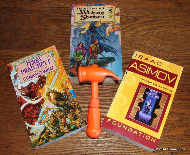 Guards Guards by Terry Pratchett, Wishsong of Shannara by Terry Brooks, Foundation by Isaac Asimov