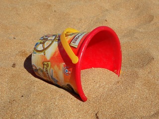 bucket in sand