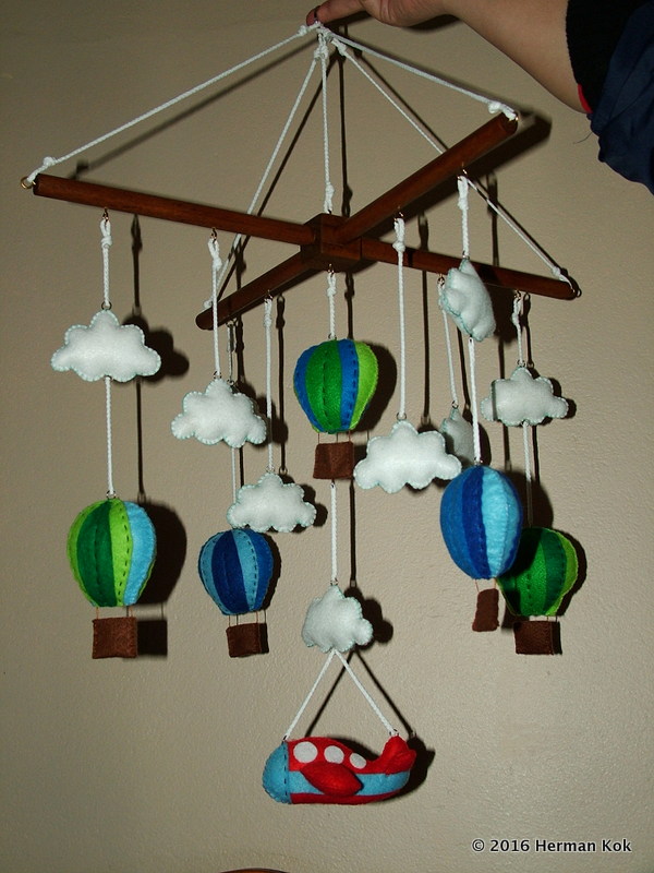 Mobile with balloons and plane